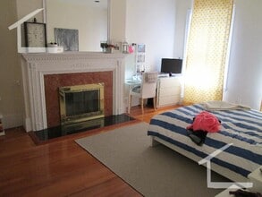 Building Photo - Washington Sq. Location. 3 Full Bathrooms, Porch, Central Heat/AC