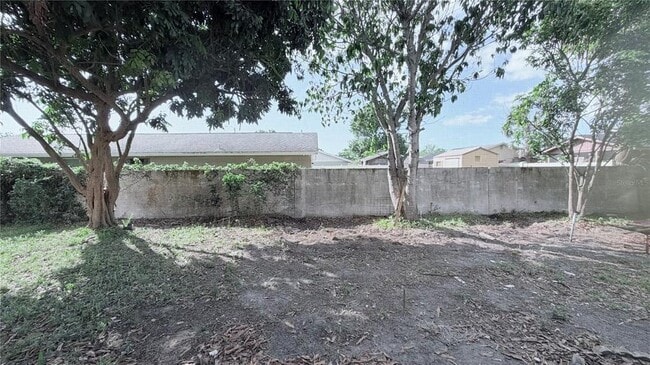 Building Photo - 10216 Oasis Palm Dr