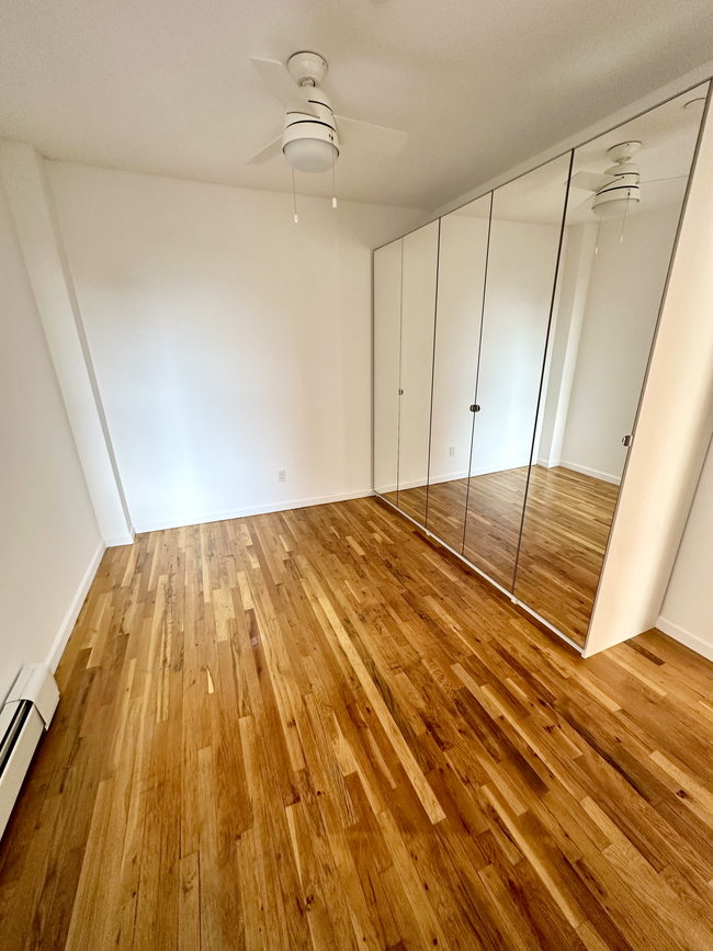 Bedroom 1 with Wardrobe - 2322 Adam Clayton Powell Jr Blvd