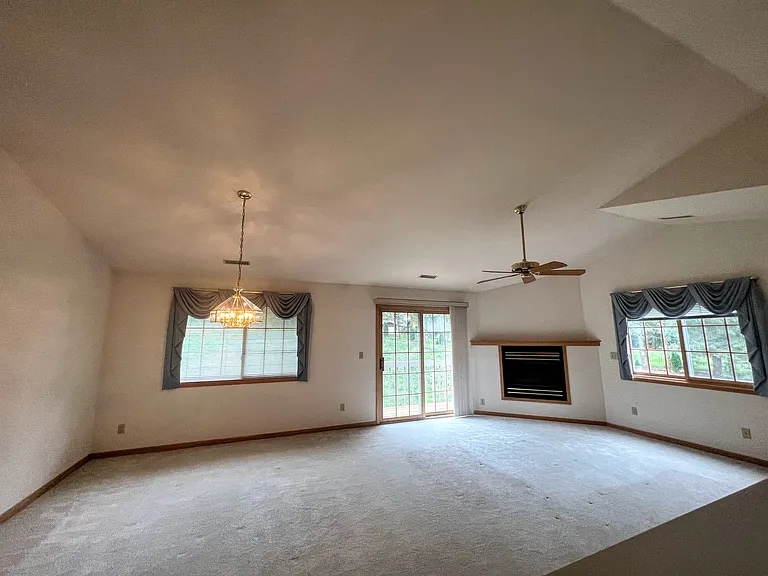 Living room opening to a balcony - 18475 Brookfield Lake Dr