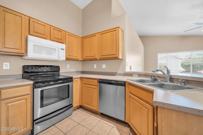 Building Photo - 8544 W Cherry Hills Dr