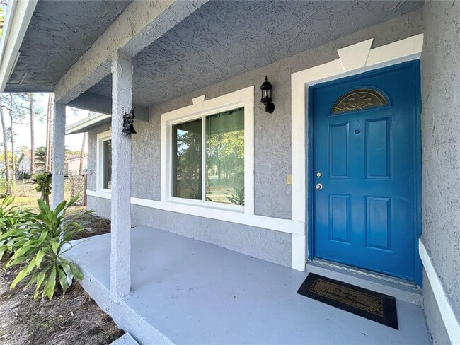 Building Photo - 6452 Royal Palm Beach Blvd