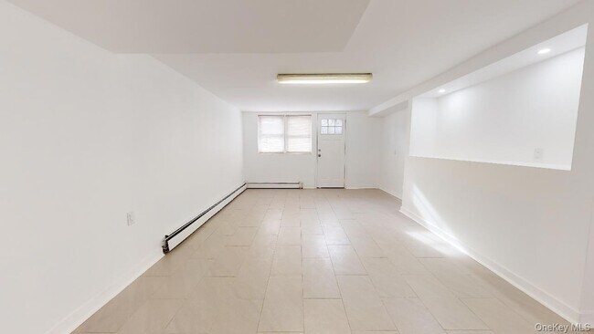 Building Photo - 67-12 Juno St