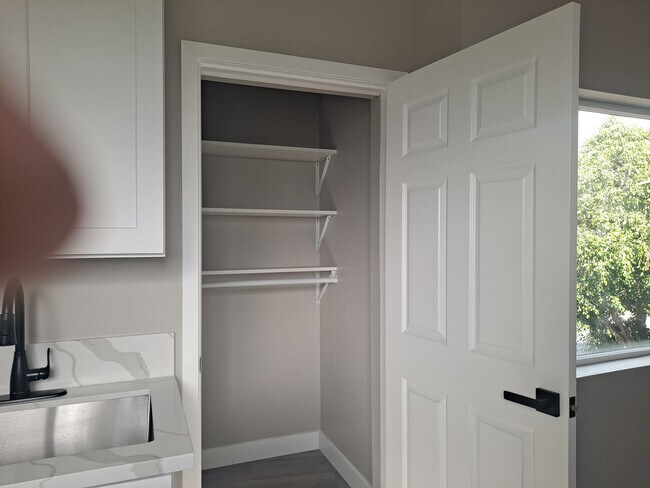 Building Photo - upstairs studio lots of natural lite