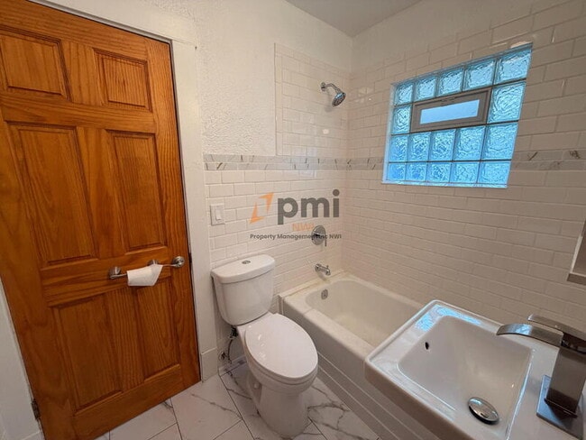 Building Photo - 6244 Madison Ave