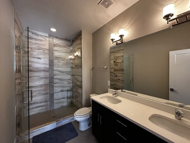 Building Photo - "Experience Modern Comfort: Spacious 2-Bed...
