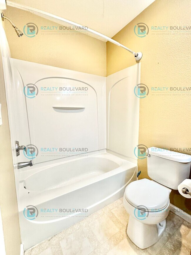 Building Photo - Open Layout, Big Yard, Great Location—This One Has It All!