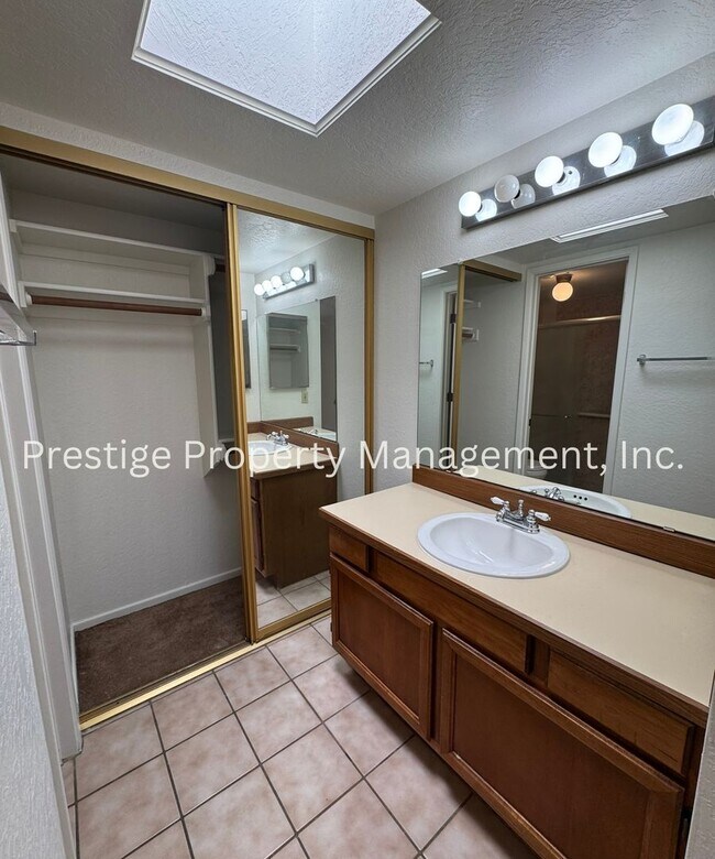 Building Photo - Totaling 3/3 With The Guest House; This Lovely Central Townhome is Everything You Need!