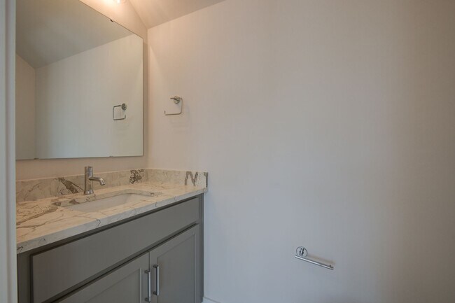 Building Photo - COMING SOON! Modern End-Unit Living Near Uptown | Rooftop Terrace + Tandem Garage