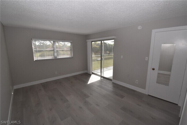 Building Photo - 5667 Rattlesnake Hammock Rd