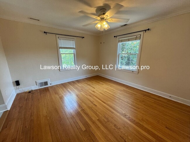 Building Photo - Charming and Updated Home in Raleigh Court with Fenced In Yard, Lawn Care Included!