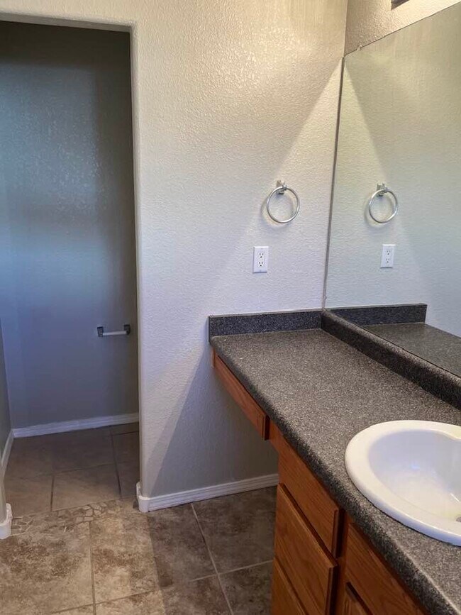 mstr bath: sink, toilet area in separate space - 6501 San Antonio Dr NE