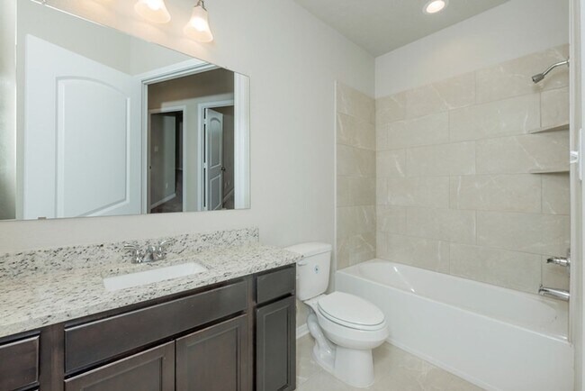 Building Photo - Live, love, and grow in this charming townhome!