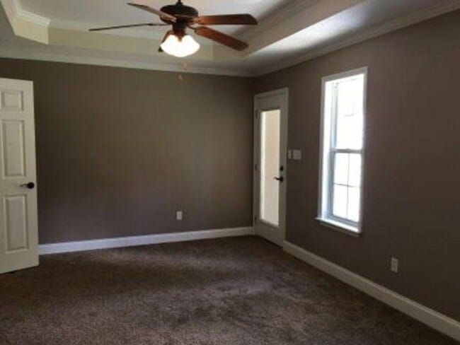 Building Photo - Spacious 3BR Brick Home with Open Split Floor Plan & Tiled Back Porch on Nearly an Acre