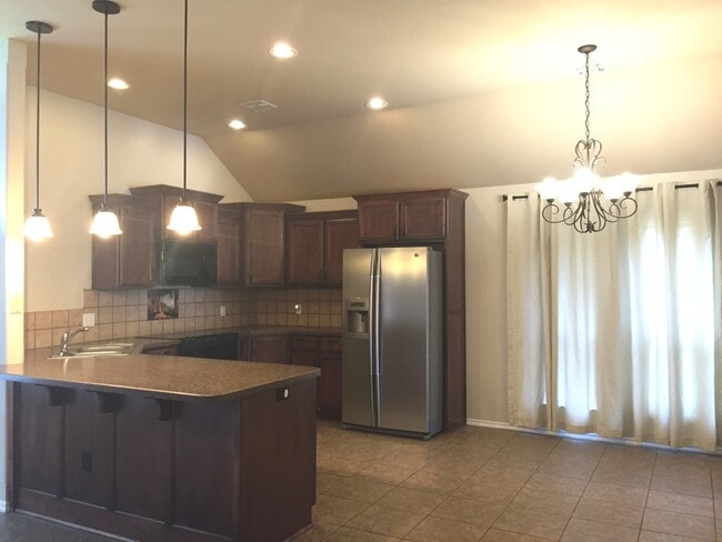 Building Photo - 16009 Bravado Pl