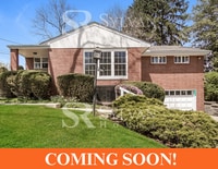 Building Photo - Welcome to this charming abode.