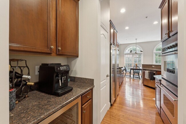 Building Photo - Discover this stunning four-level townhous...