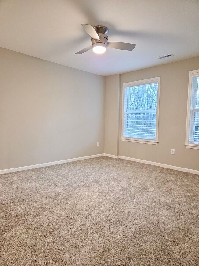 Building Photo - Exquisite just built condo with everything! Ground floor, no stairs, attached garage