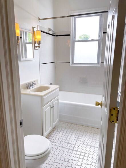 Bathroom with bathtub - 803 7th St NE