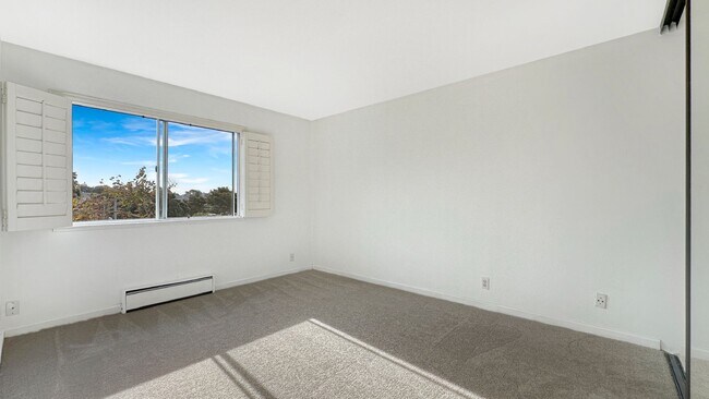 Building Photo - Exceptional Corner Unit w/ Wraparound Sout...