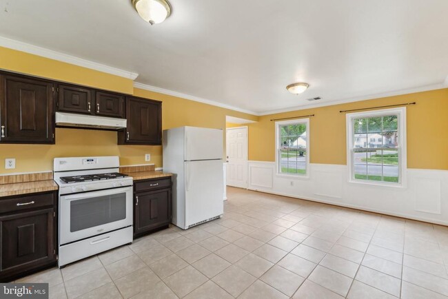 Building Photo - 5566 St Charles Dr
