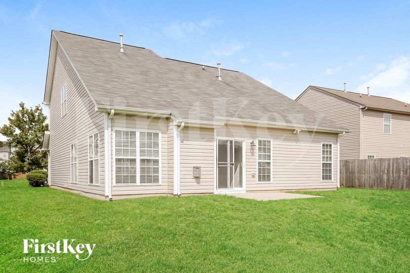 Building Photo - 6806 Championship Dr