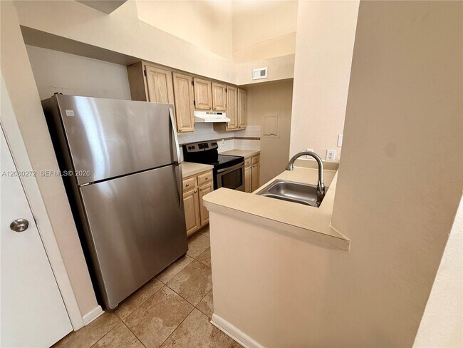 Building Photo - 1845 Palm Cove Blvd