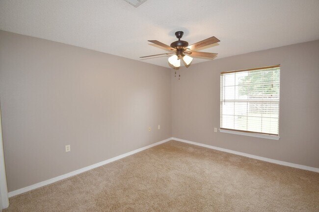 Building Photo - 2BR Patio Home with Open Layout, LVP Flooring, Private Fenced Yard, HOA Lawn Care & Convenient Bl...