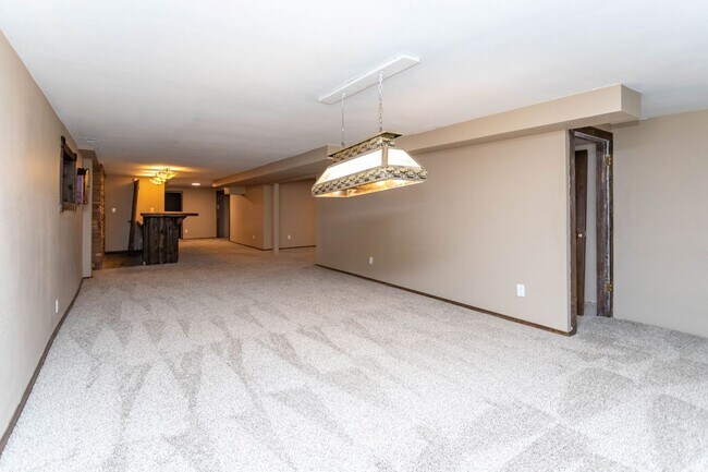 Building Photo - Comfortable Ranch-Style Living with Large Fenced Backyard!