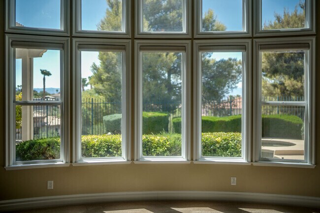 Convenient open floor plan integrates the kitchen and family room with incredible mountain views. - 2850 Bronzino Ct