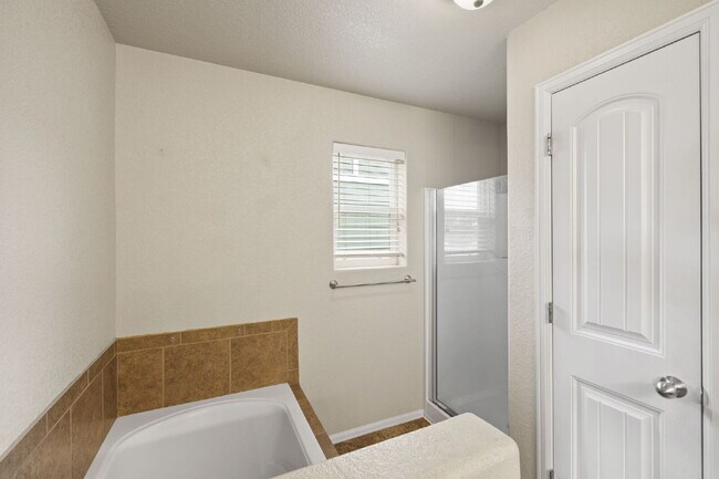 Building Photo - Spacious 4-Bedroom Home with Loft, Solar & Fenced Backyard