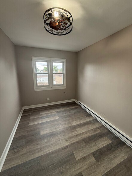 Building Photo - 1506 W 127th St