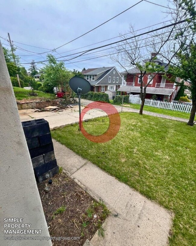 Building Photo - Four-bedroom 1.5 bath with Off street parking