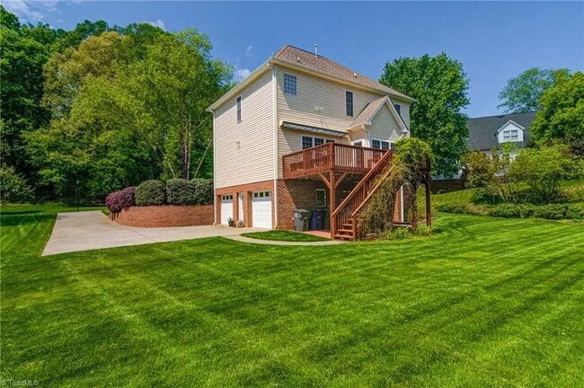 Building Photo - "Move-In Ready! Beautifully Finished 4-Bedroom Home with Fireplace, Spacious Living Areas & Deck"
