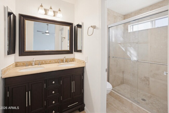 Building Photo - 9321 E Caribbean Ln