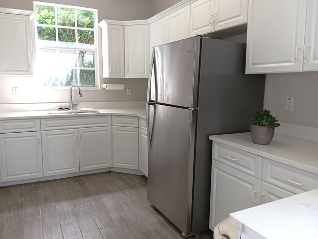Building Photo - Stunning townhome in gated community near ...
