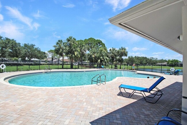 Building Photo - Annual rental: Spacious 3BR/2BA Creekwood Home with Office, Screened Lanai, EV Charger & Resort-S...