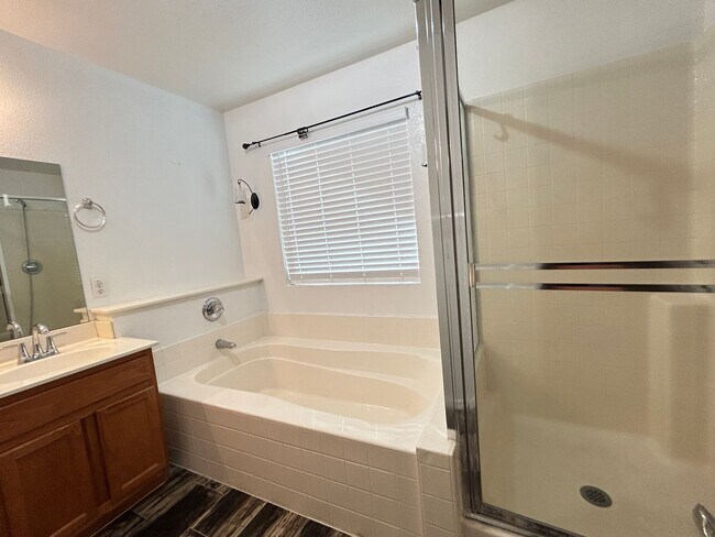 Building Photo - Unique 4 Bedroom, 2 Bathroom with 2 Car Ga...