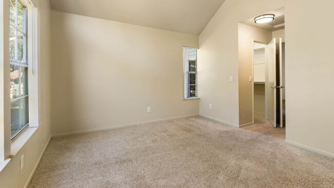 Carpeted Bedroom - Schooner Bay Apartment Homes