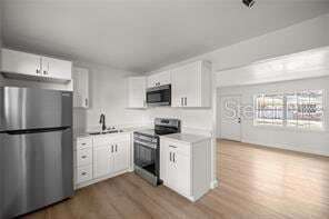 Building Photo - 411 NE 26th Ct