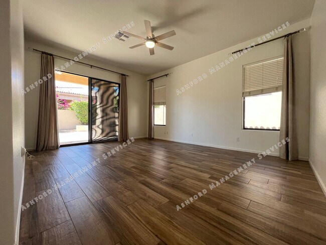 Building Photo - COME HOME TO LUXURY IN GATED GRAYHAWK GOLF...