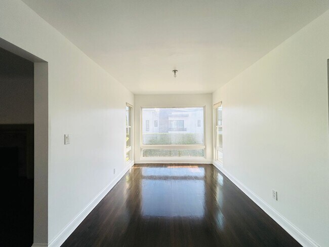 Building Photo - 8159 Willoughby Ave