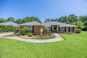Building Photo - "Coastal Elegance Awaits: Spacious 4-Bed Oasis with Granite Touches on Shipwreck Road"