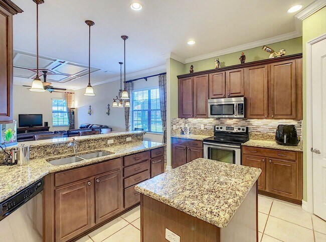 Building Photo - Luxury Living in Woodland Lakes Preserve: Fully-Furnished