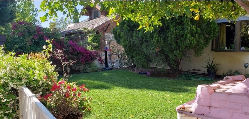 Front of main house... residential 3 separate houses... no connecting walls 3 separate private yards - 4159 La Salle Ave