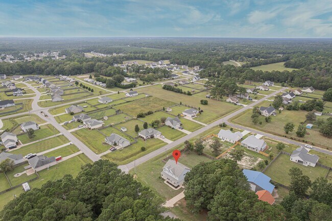 Building Photo - Coastal Elegance on a Spacious Corner Lot in Kings Harbor