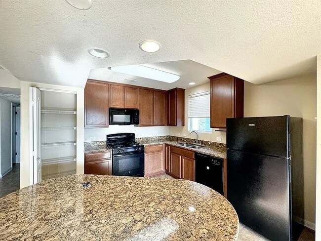 Building Photo - "Spacious 2-Bedroom Condo in San Marcos with 2 Full Baths – Experience 1,628 Sq. Ft. of Modern Co...