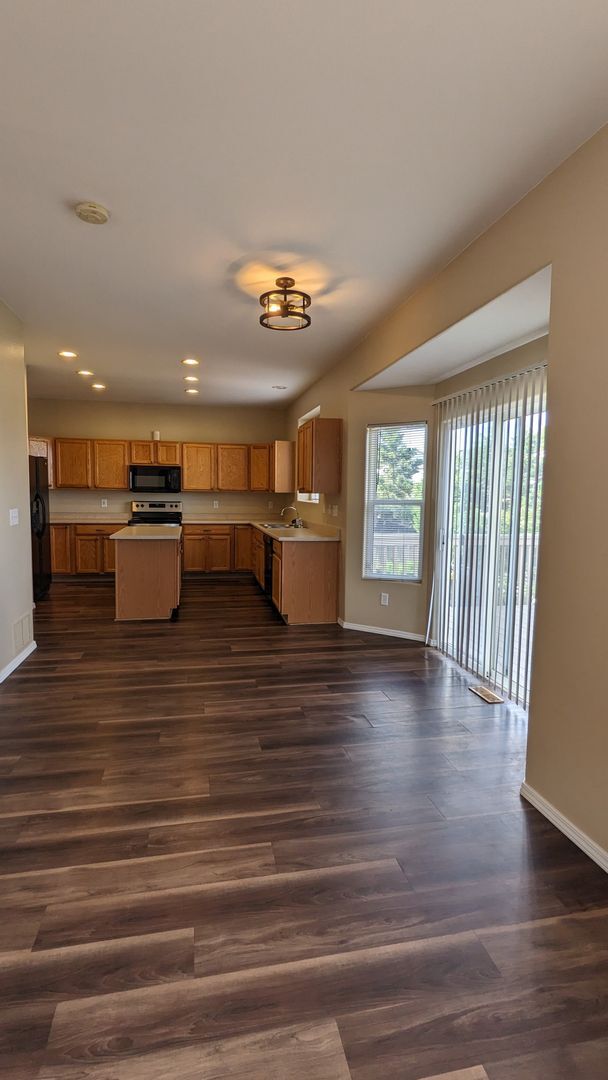 Building Photo - TWO STORY WITH FINISHED WALKOUT BASEMENT A...