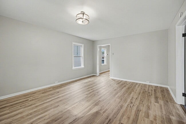 Building Photo - Updated First-Floor 2BR with Garage Parking and On-Site Laundry