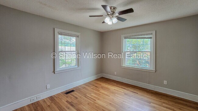 Building Photo - "Charming 4-Bed Chattanooga Home with Hard...
